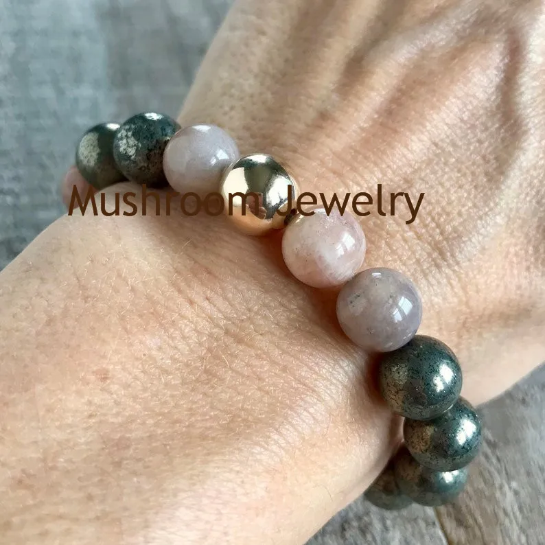 BS2019344 moonstone and pyrite beads are punctuated (2)