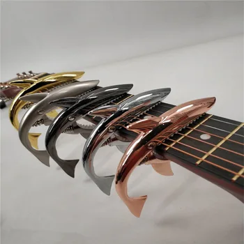 Shark guitar capo ukulele zinc metal versatile ballad guitar tone clipper musical instrument accessories
Shark guitar capo ukulele zinc metal versatile ballad guitar tone clipper musical instrument accessories