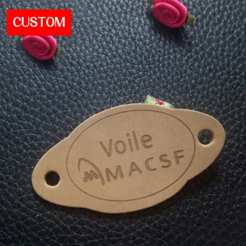 factory private customzied round PU leather embossed labels sewing on clothes handmade genuine leather signs for clothing
factory private customzied round PU leather embossed labels sewing on clothes handmade genuine leather signs for clothing