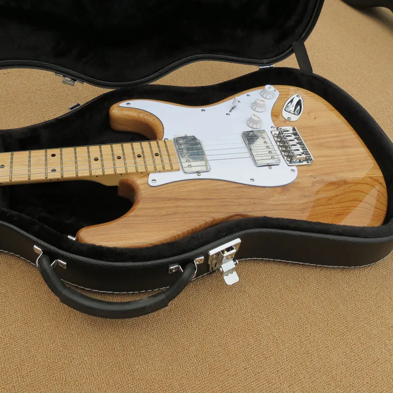 Transparent grey body electric guitar, maple neck, white guard plate, silver hardware, customized, free delivery.
Transparent grey body electric guitar, maple neck, white guard plate, silver hardware, customized, free delivery.