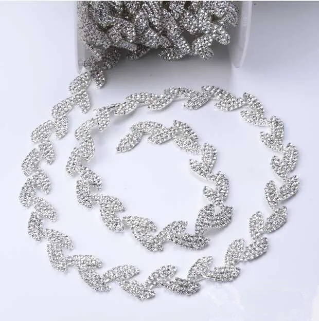 Free ship Leaf shape rhinestone silver chain trim 1yard/lot for bridal costume ornament 1.5cm width chain
Free ship Leaf shape rhinestone silver chain trim 1yard/lot for bridal costume ornament 1.5cm width chain
