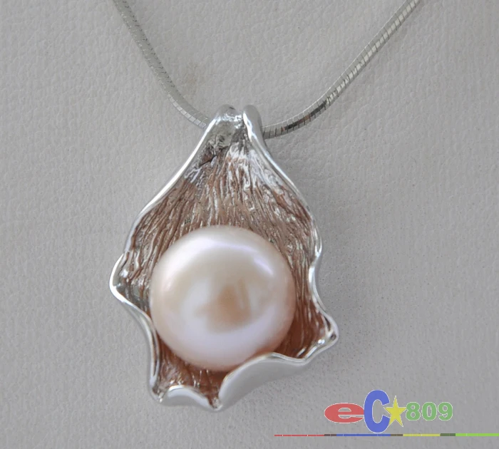 wholesale 12mm pink round freshwater cultured pearl 925silver Leaf pendant 17inch Chain
wholesale 12mm pink round freshwater cultured pearl 925silver Leaf pendant 17inch Chain