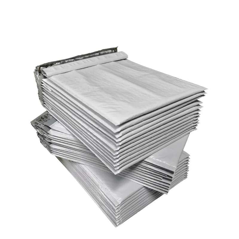 10pcs Thickened waterproof pearlescent bubble bag clothing courier bag logistics packaging bag bubble envelope bag custom foam
10pcs Thickened waterproof pearlescent bubble bag clothing courier bag logistics packaging bag bubble envelope bag custom foam