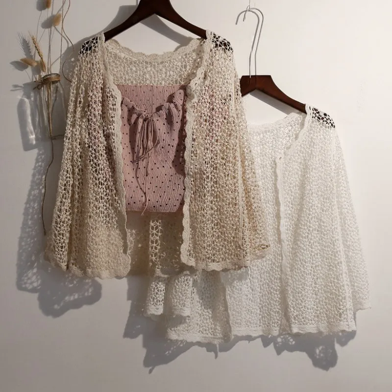 knitted outwear coat women blouse and shirts v-neck loose solid hollow out female beach style cardigan outwear tops
knitted outwear coat women blouse and shirts v-neck loose solid hollow out female beach style cardigan outwear tops