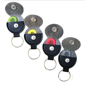 Hot Sale 1pc Genuine Leather Black Plectrum Buckle Creative Hang Buttons Case Guitar Keychain Pick Holder Guitar Accessories
Hot Sale 1pc Genuine Leather Black Plectrum Buckle Creative Hang Buttons Case Guitar Keychain Pick Holder Guitar Accessories