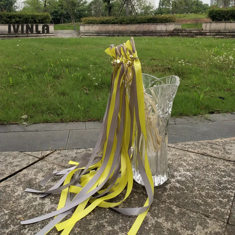 50pcs/lot light sliver and yellow wedding ribbon wands With big Bells for wedding decoration
50pcs/lot light sliver and yellow wedding ribbon wands With big Bells for wedding decoration