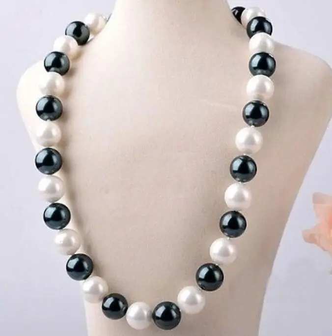 FREE SHIPPING14MM black white south sea shell pearl necklace 23
FREE SHIPPING14MM black white south sea shell pearl necklace 23
