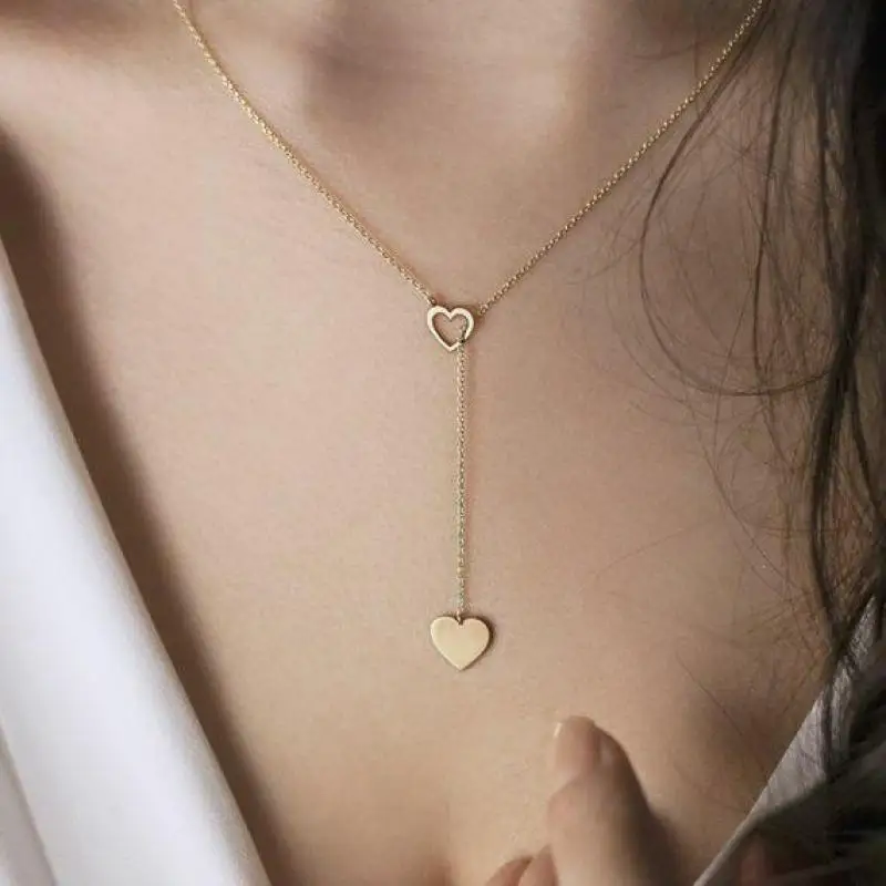 Ladies Small Gold Chain Clavicle Necklace Fashion New Personality Peach Heart Long Pendant Women's Y-shaped Necklace Jewelry
Ladies Small Gold Chain Clavicle Necklace Fashion New Personality Peach Heart Long Pendant Women's Y-shaped Necklace Jewelry