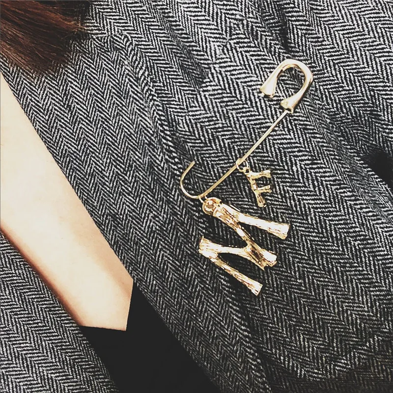 SHIFEEL New Fashion Europe America Popular Letter M F design Pin shape Personality Simple Metal style Brooch For Women
SHIFEEL New Fashion Europe America Popular Letter M F design Pin shape Personality Simple Metal style Brooch For Women