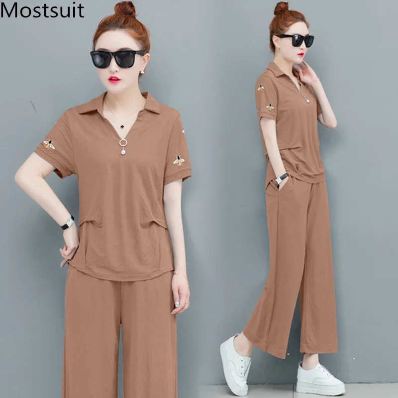 2019 Summer Two Piece Sets Tracksuits Women Plus Size Short Sleeve Embroidery Tops And Wide Leg Pants Casual Sport Suits Sets
2019 Summer Two Piece Sets Tracksuits Women Plus Size Short Sleeve Embroidery Tops And Wide Leg Pants Casual Sport Suits Sets