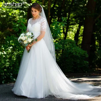 Romantic White A line Beach Wedding Dresses Lace Applique Short Sleeves Bridal Gown Vestido de noiva Modest Lace Top Boho Bridal
Romantic White A line Beach Wedding Dresses Lace Applique Short Sleeves Bridal Gown Vestido de noiva Modest Lace Top Boho Bridal
