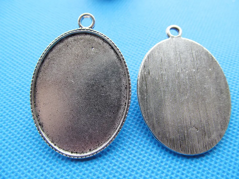 5pcs Antique Silver/Antique Bronze Oval Base Setting Tray Bezel Pendant Charm/Finding,fit 30mmx40mm Cabochon/Cameo,DIY Jewellry
5pcs Antique Silver/Antique Bronze Oval Base Setting Tray Bezel Pendant Charm/Finding,fit 30mmx40mm Cabochon/Cameo,DIY Jewellry