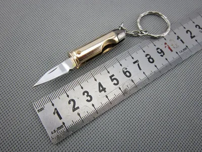 free shipping Small bullet shape gift key button creative knife Carry a MINI pocket knife #20
free shipping Small bullet shape gift key button creative knife Carry a MINI pocket knife #20