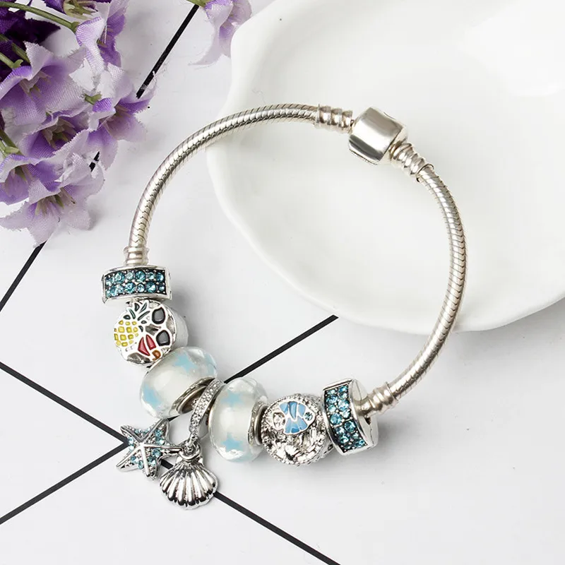 Metal Fashion Star Pendant Fruit Fish Pattern Shell Crystal Bracelet 925 Sterling Silver Fashion Bracelet Gift for Ladies
Metal Fashion Star Pendant Fruit Fish Pattern Shell Crystal Bracelet 925 Sterling Silver Fashion Bracelet Gift for Ladies
