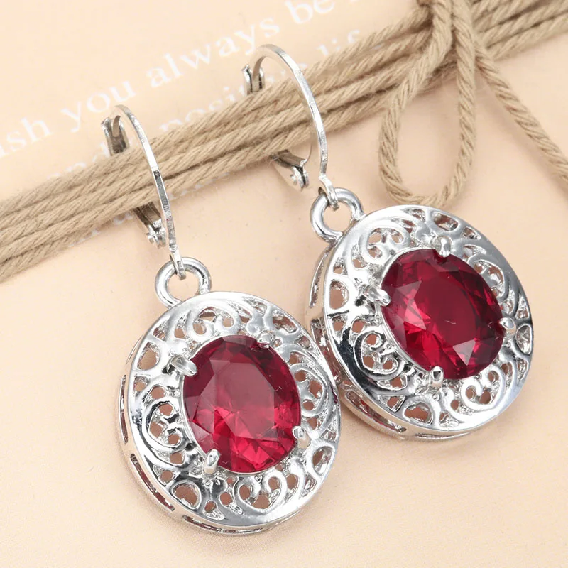 Vintage Round CZ Stone Dangle Red Earrings for Women Hollow Out Silver Color Drop Earrings Jewelry Bridal oorbellen H3E425
Vintage Round CZ Stone Dangle Red Earrings for Women Hollow Out Silver Color Drop Earrings Jewelry Bridal oorbellen H3E425