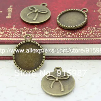 Sweet Bell 50pcs Vintage bowknot Style Metal Alloy Round Cabochon Settings 18mm Antique Bronze Cabochon Pendant Settings 7B1156
Sweet Bell 50pcs Vintage bowknot Style Metal Alloy Round Cabochon Settings 18mm Antique Bronze Cabochon Pendant Settings 7B1156