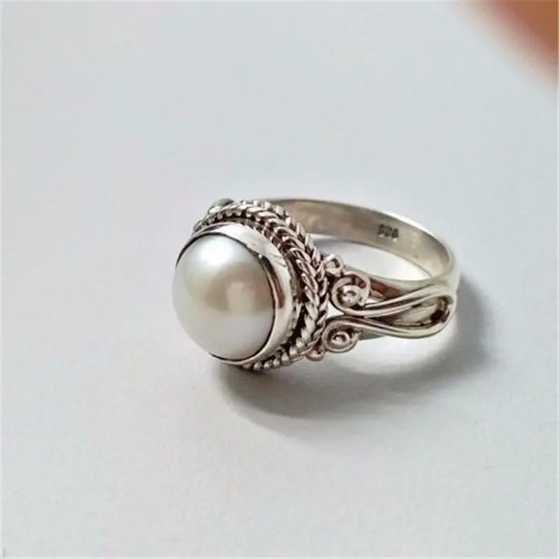 Vintage White Pearl Rings For Women Simple Silver Ring Wedding Engagement Ring Fine Jewelry Bague Femme Anillos Mujer E5T594
Vintage White Pearl Rings For Women Simple Silver Ring Wedding Engagement Ring Fine Jewelry Bague Femme Anillos Mujer E5T594