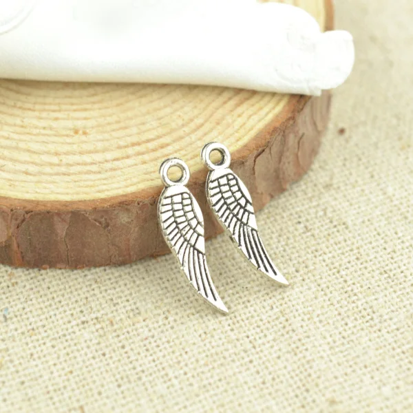 High quality 100 pcs metal antique silver Plated wing charms for DIY jewelry making 19*5mm 2404
High quality 100 pcs metal antique silver Plated wing charms for DIY jewelry making 19*5mm 2404