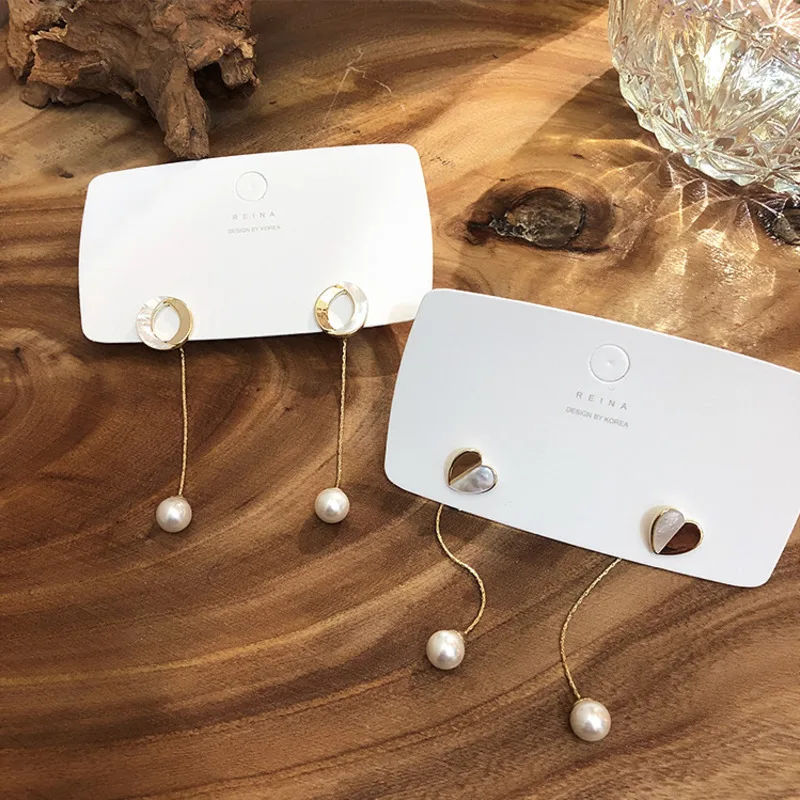 Korean Earrings Shell Heart Shape Baroque Pearl Earrings Pendant Pair Fashion Women Ear Rings 2019 Hypoallergenic Copper Jewelry
Korean Earrings Shell Heart Shape Baroque Pearl Earrings Pendant Pair Fashion Women Ear Rings 2019 Hypoallergenic Copper Jewelry