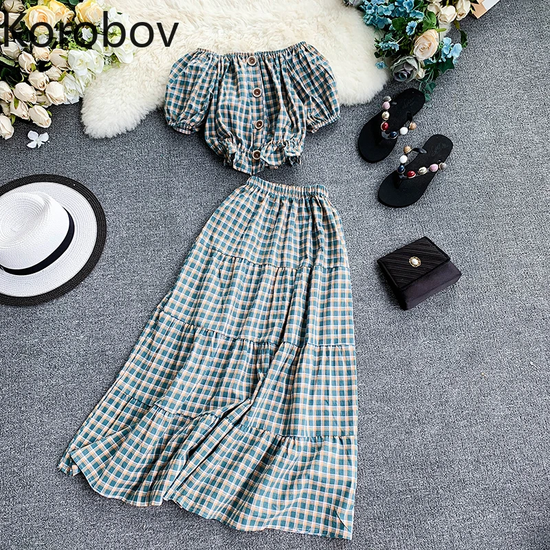 Korobov Sexy Slash Neck Puff Sleeve Crop Top and Stretch High Waist A Line Long Skirt 2 Piece Set Beach Style Women Outfit 78334
Korobov Sexy Slash Neck Puff Sleeve Crop Top and Stretch High Waist A Line Long Skirt 2 Piece Set Beach Style Women Outfit 78334