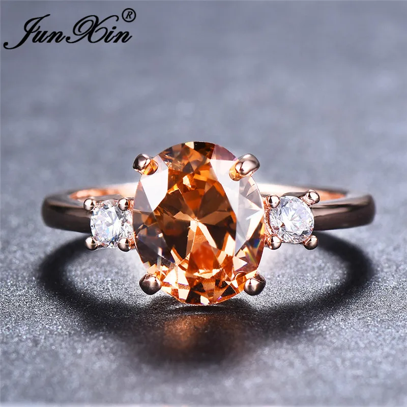 JUNXIN Dianty Egg Stone Oval Zircon Champagne Rings For Women 18KT Rose Gold Filled Big Crystal Birthstone Wedding Ring Female
JUNXIN Dianty Egg Stone Oval Zircon Champagne Rings For Women 18KT Rose Gold Filled Big Crystal Birthstone Wedding Ring Female