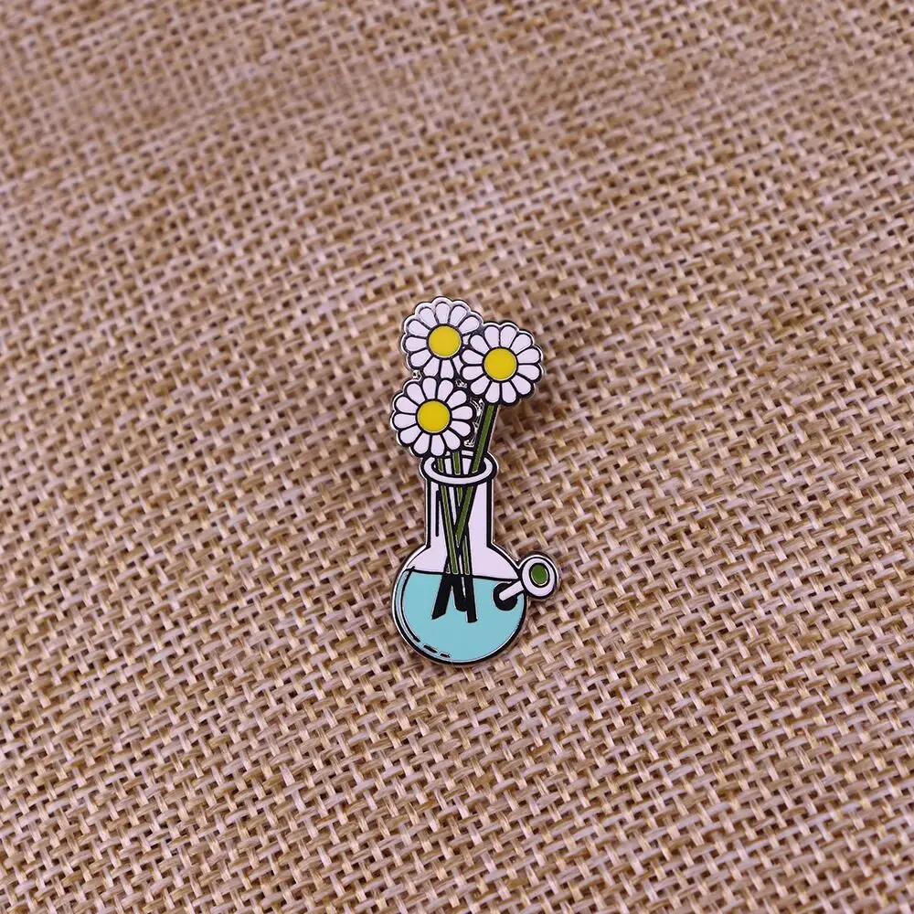 Daisy in a bottle enamel pin flower art brooch chemical experimental jewelry science badge women gift
Daisy in a bottle enamel pin flower art brooch chemical experimental jewelry science badge women gift