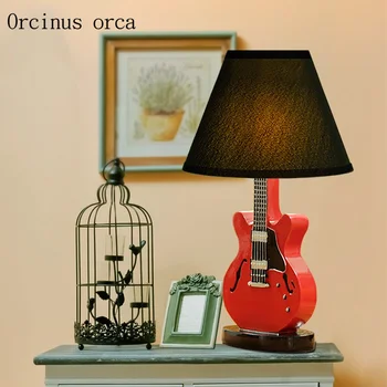 Cartoon creative guitar table lamp children bedroom boy bedroom lamp American modern simple red LED desk lamp free shipping
Cartoon creative guitar table lamp children bedroom boy bedroom lamp American modern simple red LED desk lamp free shipping