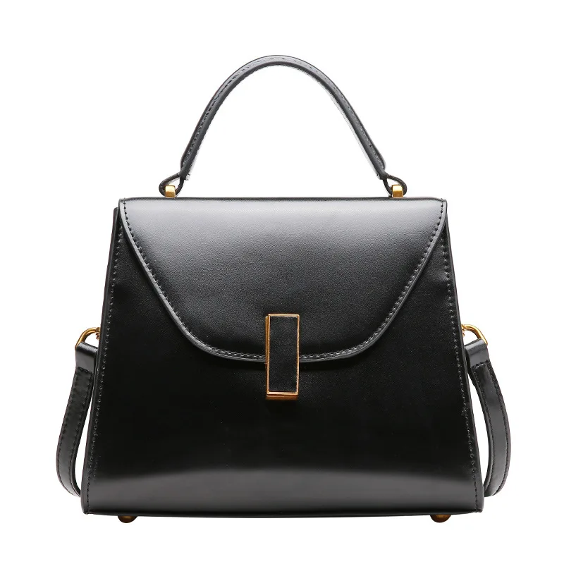 Women's new retro cross-section leather handbag Simple wild trapezoidal cover bag leather Kelly bag
Women's new retro cross-section leather handbag Simple wild trapezoidal cover bag leather Kelly bag