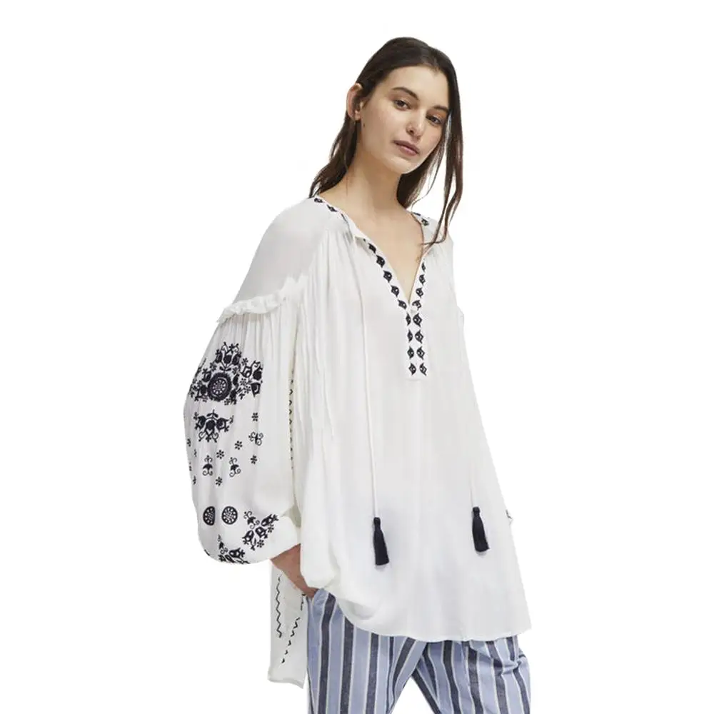 Fashion women's bohemian holiday wind V neck embroidery tassel system bandwidth loose version long long-sleeved shirt
Fashion women's bohemian holiday wind V neck embroidery tassel system bandwidth loose version long long-sleeved shirt