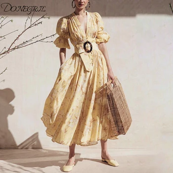 2019 summer new retro V-neck single-breasted puff sleeve print waist holiday dress dress female
2019 summer new retro V-neck single-breasted puff sleeve print waist holiday dress dress female