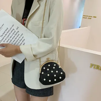 Mini Shell Shoulder Bags for Women Pearls 2019 Summer Knitted Tote Female Luxury Handbags Handmade Beach Woven Crossbody Bags
Mini Shell Shoulder Bags for Women Pearls 2019 Summer Knitted Tote Female Luxury Handbags Handmade Beach Woven Crossbody Bags