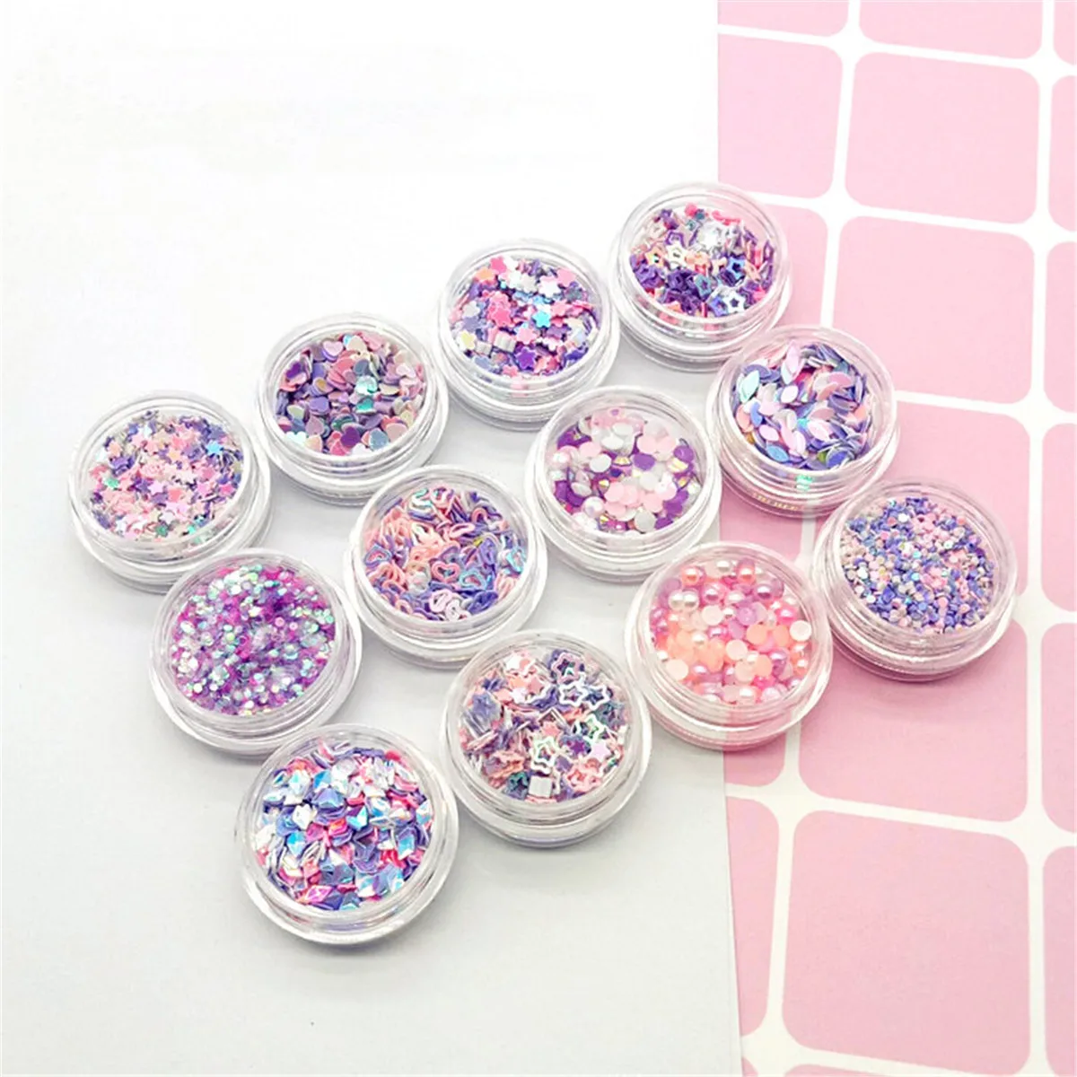 12 Box Nail Art Glitter Dust Sequins Pink Purple Mix Love Star Dot Decoration Nails Paillette Flakes Eyes Makeup Accessories
12 Box Nail Art Glitter Dust Sequins Pink Purple Mix Love Star Dot Decoration Nails Paillette Flakes Eyes Makeup Accessories