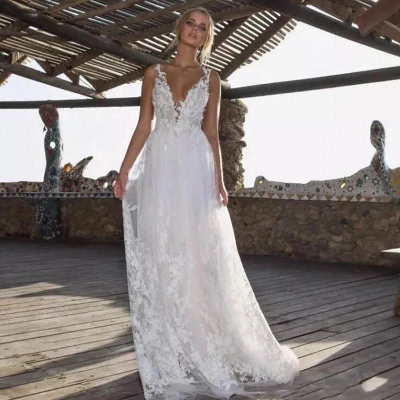 White Beach Wedding Dresses Lace Appliques Deep V Neck Vestidos De Novia 2019 Bridal Gowns Sleeveless Floor Length Plus Size
White Beach Wedding Dresses Lace Appliques Deep V Neck Vestidos De Novia 2019 Bridal Gowns Sleeveless Floor Length Plus Size