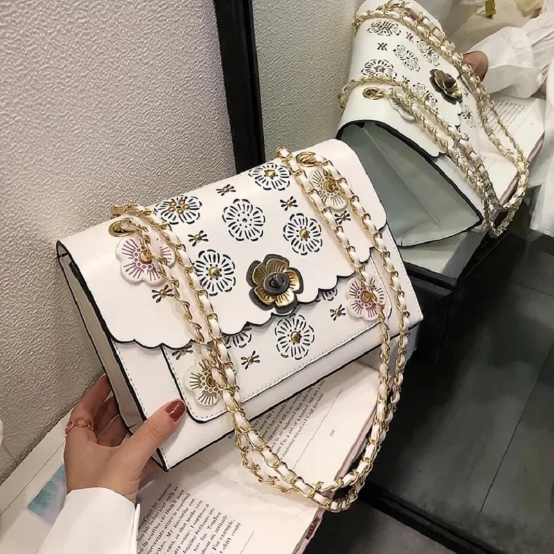 Fashion Ladies Chain Messenger Bags Women PU Leather Flowers Hollow Out Shoulder Bags Female Chic Designer Handbags 2019 New
Fashion Ladies Chain Messenger Bags Women PU Leather Flowers Hollow Out Shoulder Bags Female Chic Designer Handbags 2019 New