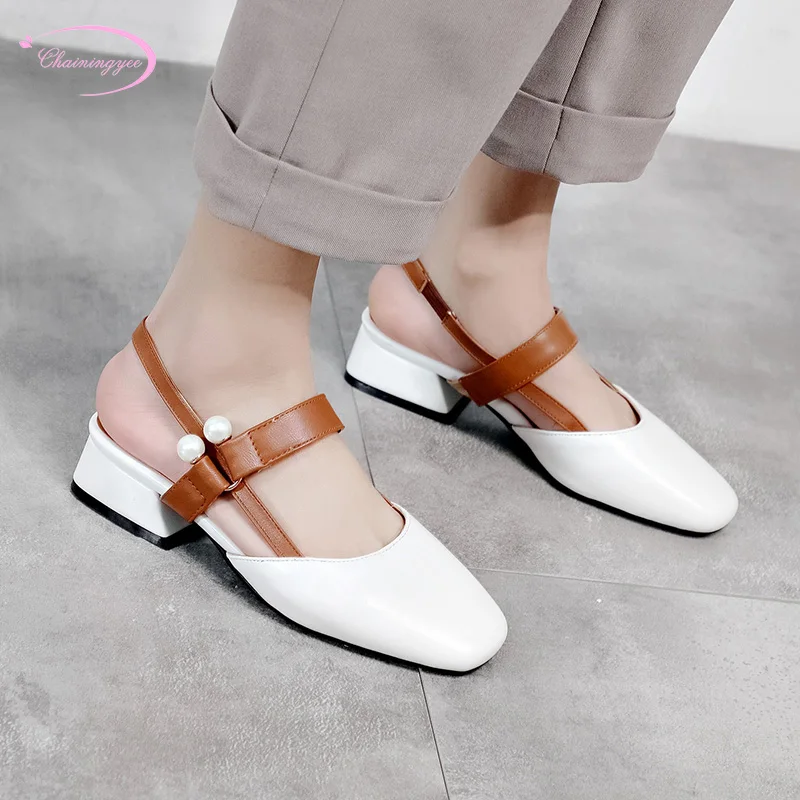 Chinese party style square toe summer cool sandals matching color beaded belt buckle white black thick medium heel women shoes
Chinese party style square toe summer cool sandals matching color beaded belt buckle white black thick medium heel women shoes