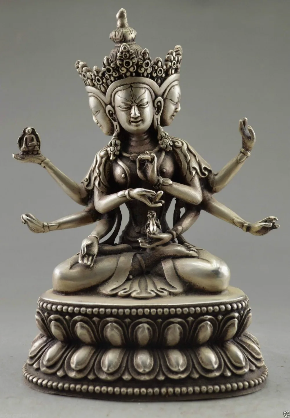 Collectible Decorated Old Handwork Tibet Silver Carve Buddha 3 Head 6 Arm Statue
Collectible Decorated Old Handwork Tibet Silver Carve Buddha 3 Head 6 Arm Statue