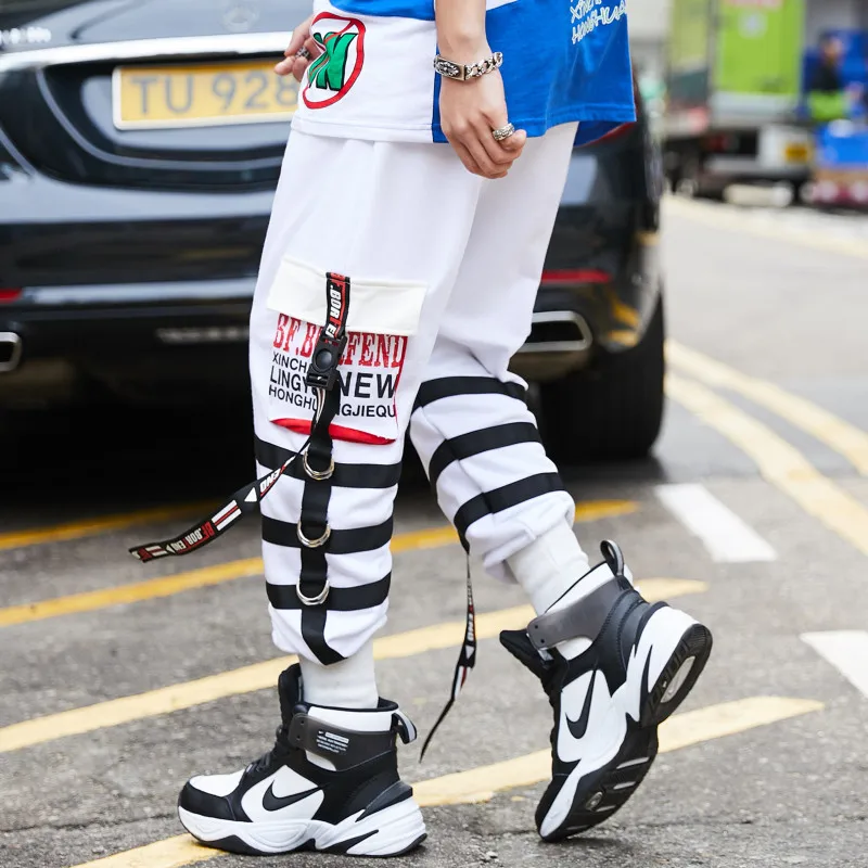 Men ribbon patchwork street punk rock hip hop cargo pants black white joggers man vintage casual sweatpants elastic waist
Men ribbon patchwork street punk rock hip hop cargo pants black white joggers man vintage casual sweatpants elastic waist
