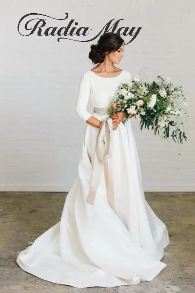 Bohemian 3/4 Long Sleeves Satin Ivory Wedding Dresses with Beaded Crystals Belt Scoop Open Back Boho Beach Wedding Dress 2019
Bohemian 3/4 Long Sleeves Satin Ivory Wedding Dresses with Beaded Crystals Belt Scoop Open Back Boho Beach Wedding Dress 2019