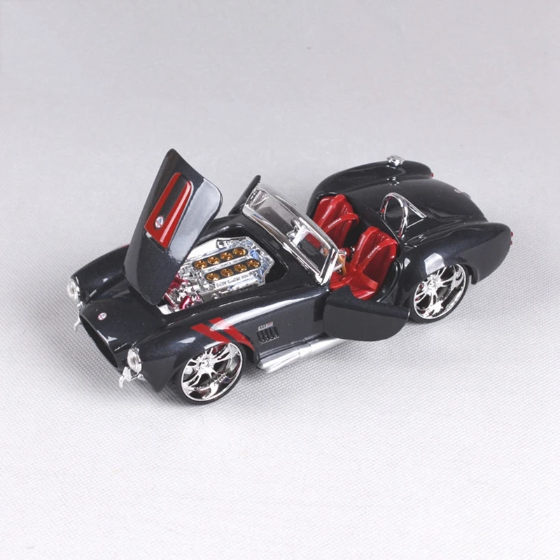 1965 Shelby Cobra 427 1:24 Maisto alloy car model metal diecast Ford Mustang Classic cars Roadster collection gift toy
1965 Shelby Cobra 427 1:24 Maisto alloy car model metal diecast Ford Mustang Classic cars Roadster collection gift toy