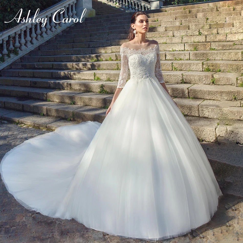 Ashley Carol Elegant Boat Neck Three Quarter Lace Wedding Dress 2019 Beaded Appliques Bride Dresses Chapel Train Wedding Gowns
Ashley Carol Elegant Boat Neck Three Quarter Lace Wedding Dress 2019 Beaded Appliques Bride Dresses Chapel Train Wedding Gowns