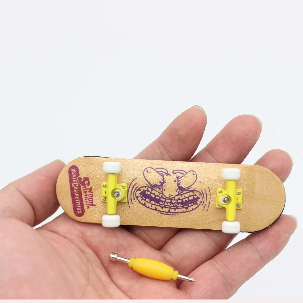 Newest Mini wood fingerboard finger board skateboard toys for children funny wooden interesting birthday Christmas gift adult
Newest Mini wood fingerboard finger board skateboard toys for children funny wooden interesting birthday Christmas gift adult