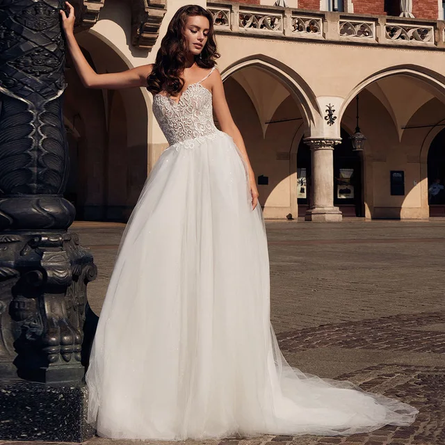 Lace Top A-line Wedding Gowns Custom made Tulle Lace Up Back Wedding Dress Vestido De Novia Spaghetti Straps Sleeveless
Lace Top A-line Wedding Gowns Custom made Tulle Lace Up Back Wedding Dress Vestido De Novia Spaghetti Straps Sleeveless