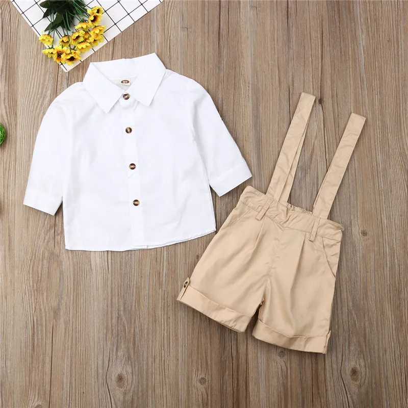 Formal Kids Baby Boy Party Clothes Gentlemen Sets White Long Sleeve Button Shirts+Strap Pants Solid 2Pcs Cotton Boy Outfits 2-7Y
Formal Kids Baby Boy Party Clothes Gentlemen Sets White Long Sleeve Button Shirts+Strap Pants Solid 2Pcs Cotton Boy Outfits 2-7Y