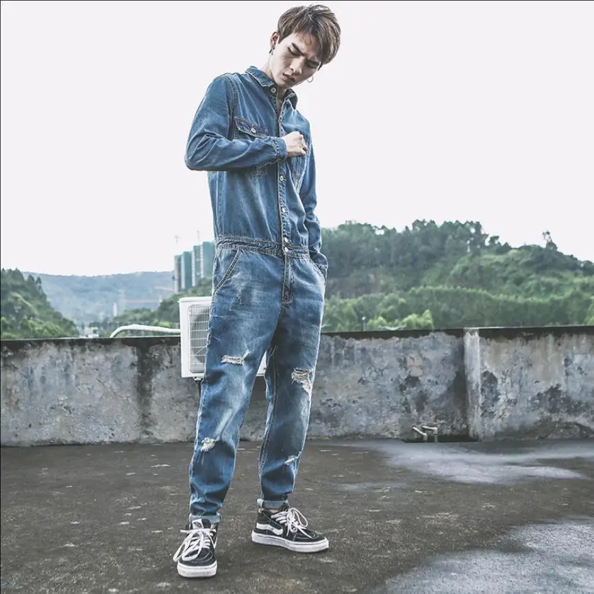 M-2XL New Japanese denim jumpsuit men autumn locomotive overalls bib pants youth hole feet jeans hairstylist Overalls Rompers
M-2XL New Japanese denim jumpsuit men autumn locomotive overalls bib pants youth hole feet jeans hairstylist Overalls Rompers