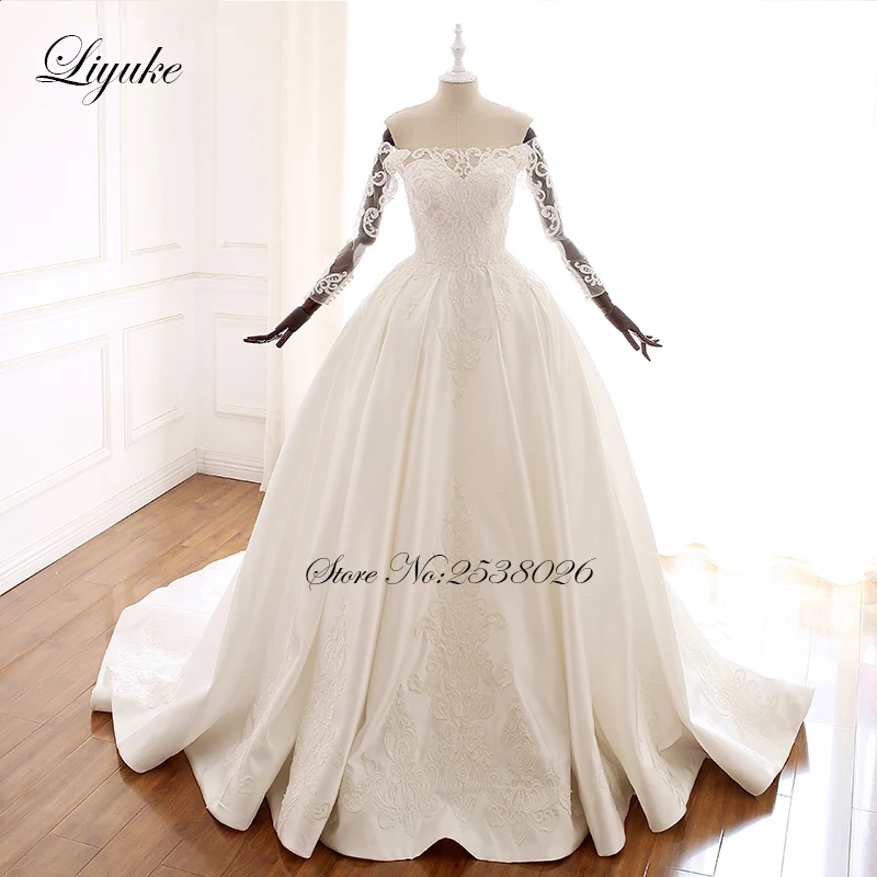 Liyuke Beautiful Lace A-Line Wedding Dresses With Off The Shoulder Sleeve Button Closure Wedding Gown
Liyuke Beautiful Lace A-Line Wedding Dresses With Off The Shoulder Sleeve Button Closure Wedding Gown