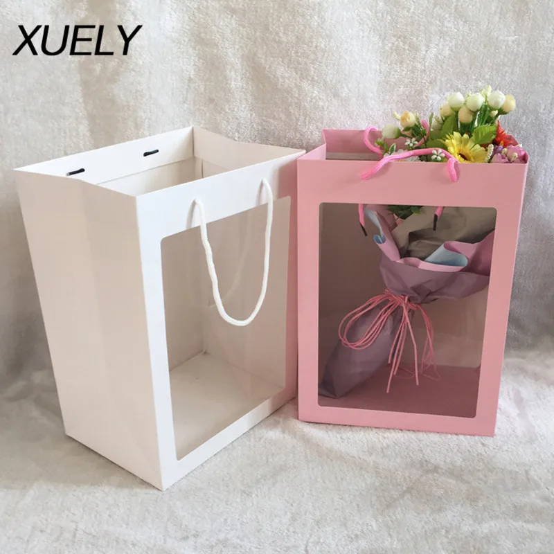 XUELY Window Tote Bag thick kraft paper bag with handles Christmas Flower Bundle Packaging Gift Bag flowers paper Gift boxes
XUELY Window Tote Bag thick kraft paper bag with handles Christmas Flower Bundle Packaging Gift Bag flowers paper Gift boxes