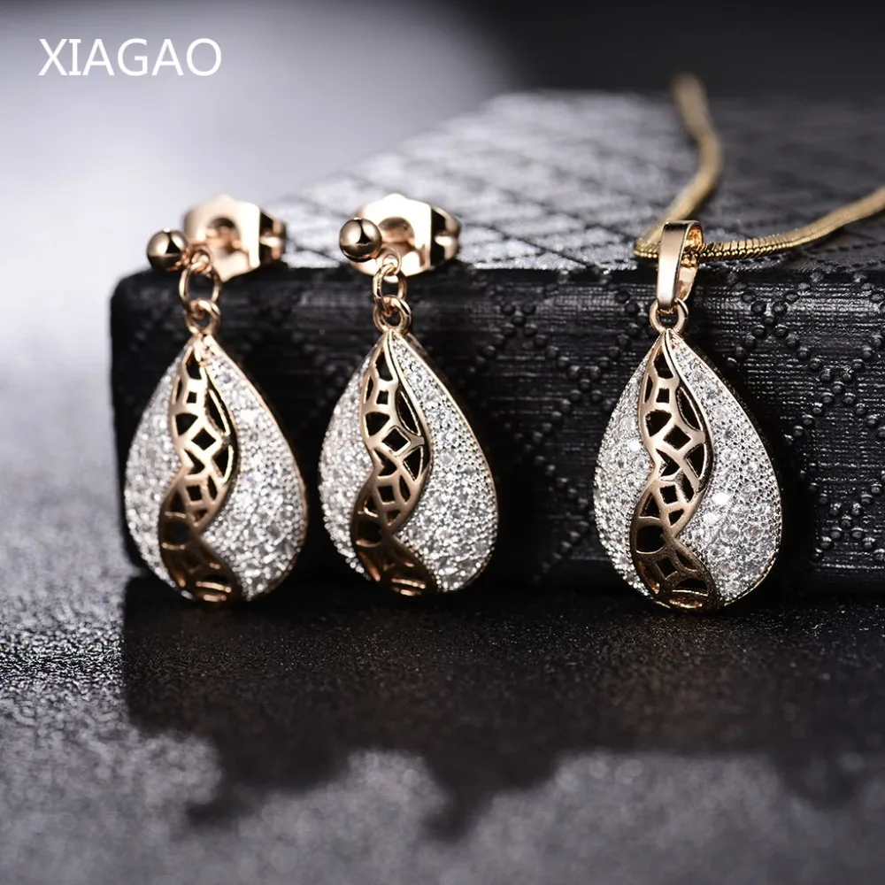 XIAGAO Brand New Luxury Hollow Jewelry Set Gold Color Oval Pendant Necklace Earrings for Women Wedding Engagement Jewelry XGT024
XIAGAO Brand New Luxury Hollow Jewelry Set Gold Color Oval Pendant Necklace Earrings for Women Wedding Engagement Jewelry XGT024