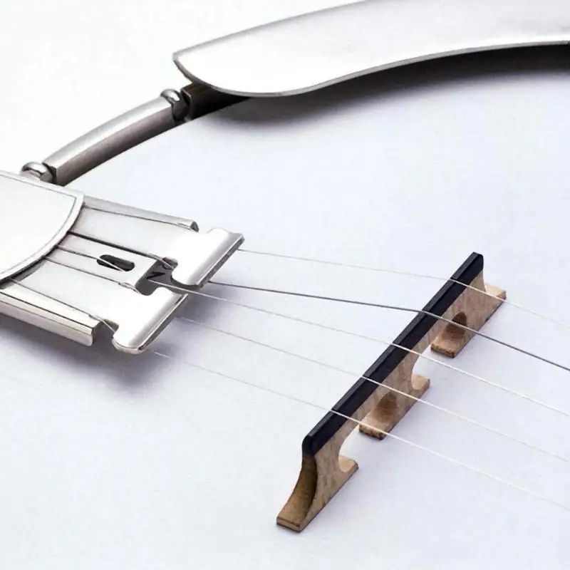 2pcs/set 5-String Rose Wood Banjo Leader Bridge Saddle with 3 Feet for Guitar Banjo Guitar Parts & Accessories 75 x 15 x 5mm
2pcs/set 5-String Rose Wood Banjo Leader Bridge Saddle with 3 Feet for Guitar Banjo Guitar Parts & Accessories 75 x 15 x 5mm