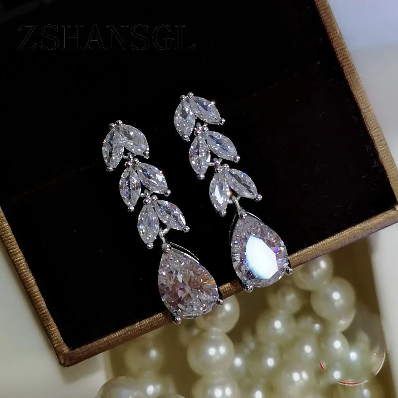 Fashion Female Crystal Leaf Drop Earrings 925 Silver filled White Zircon Earrings Boho Wedding Jewelry Long Dangle Earrings
Fashion Female Crystal Leaf Drop Earrings 925 Silver filled White Zircon Earrings Boho Wedding Jewelry Long Dangle Earrings