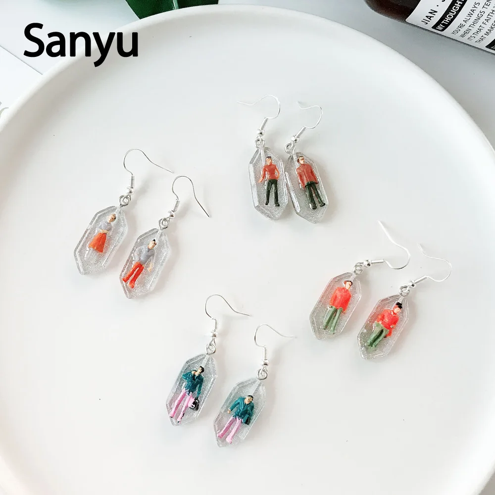 New Arrival Funny Handmade Little Human Capsule Drop Earrings for Women Girls Glitter Powder Humanoid Personalized Brincos 2019
New Arrival Funny Handmade Little Human Capsule Drop Earrings for Women Girls Glitter Powder Humanoid Personalized Brincos 2019